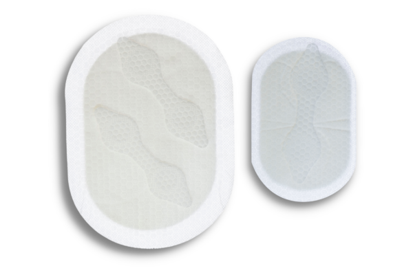 Dressing and fastener on top side by side